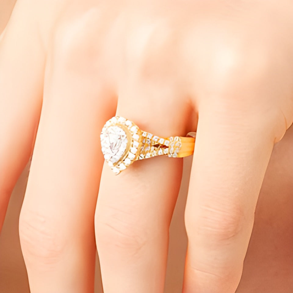 0.63 CT. TW Pear-Shaped Diamond Layered Twist Split Shank Engagement Ring in 10K Gold