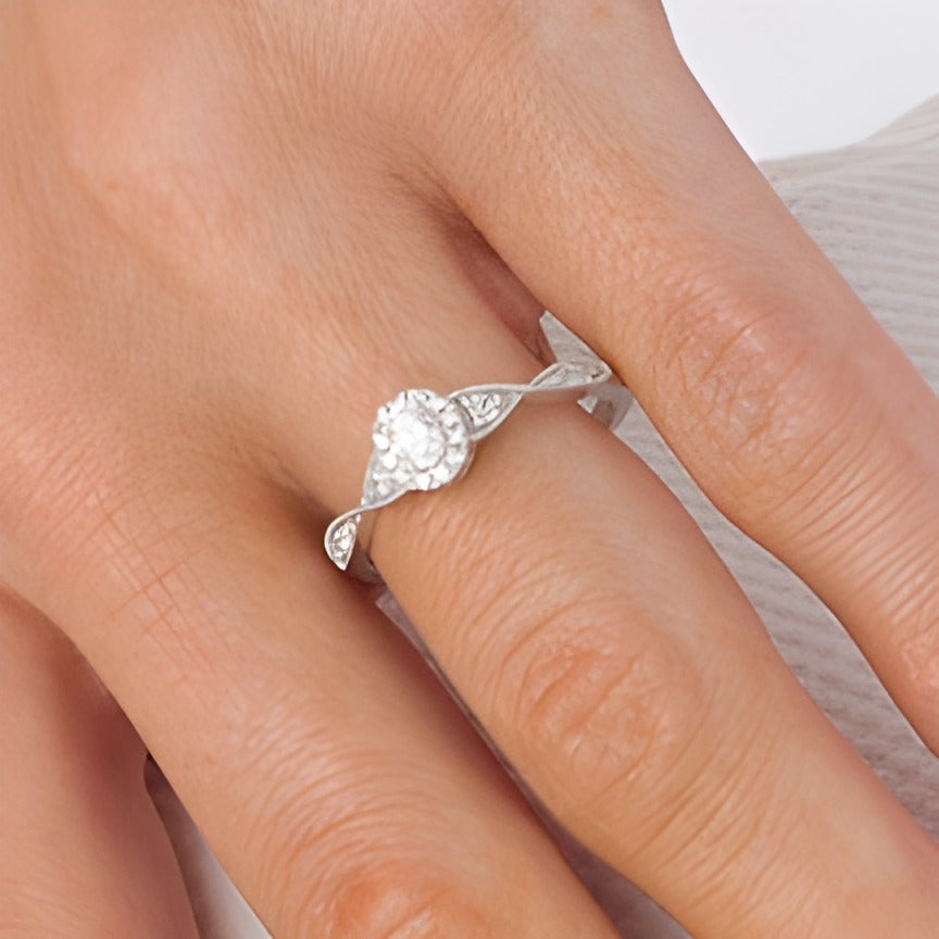 0.33 CT. TW Oval Diamond Frame Twist Shank Engagement Ring in 14K White Gold (I/SI2)
