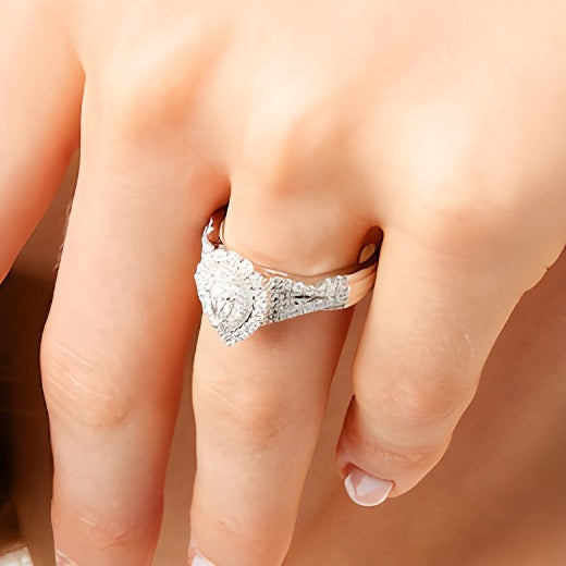 0.63 CT. TW Pear-Shaped Diamond Layered Twist Shank Engagement Ring in 10K White Gold