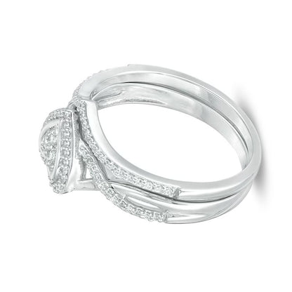 0.2 CT. TW Diamond Heart Frame Twist Bridal Set in 10K White Gold
