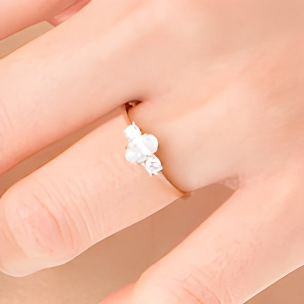 0.63 CT. TW Oval and Round Diamond Three Stone Engagement Ring in 14K Gold