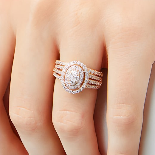 1.0 CT. TW Oval Multi-Diamond Triple Row Split Shank Bridal Set in 10K Rose Gold