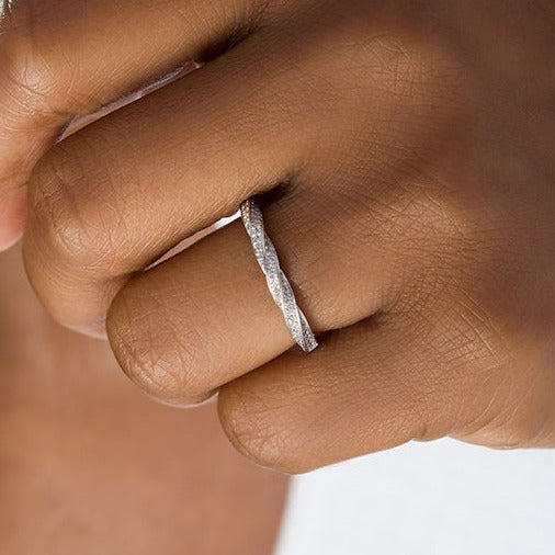 0.2 CT. TW Diamond Twist Wedding Band in 10K White Gold