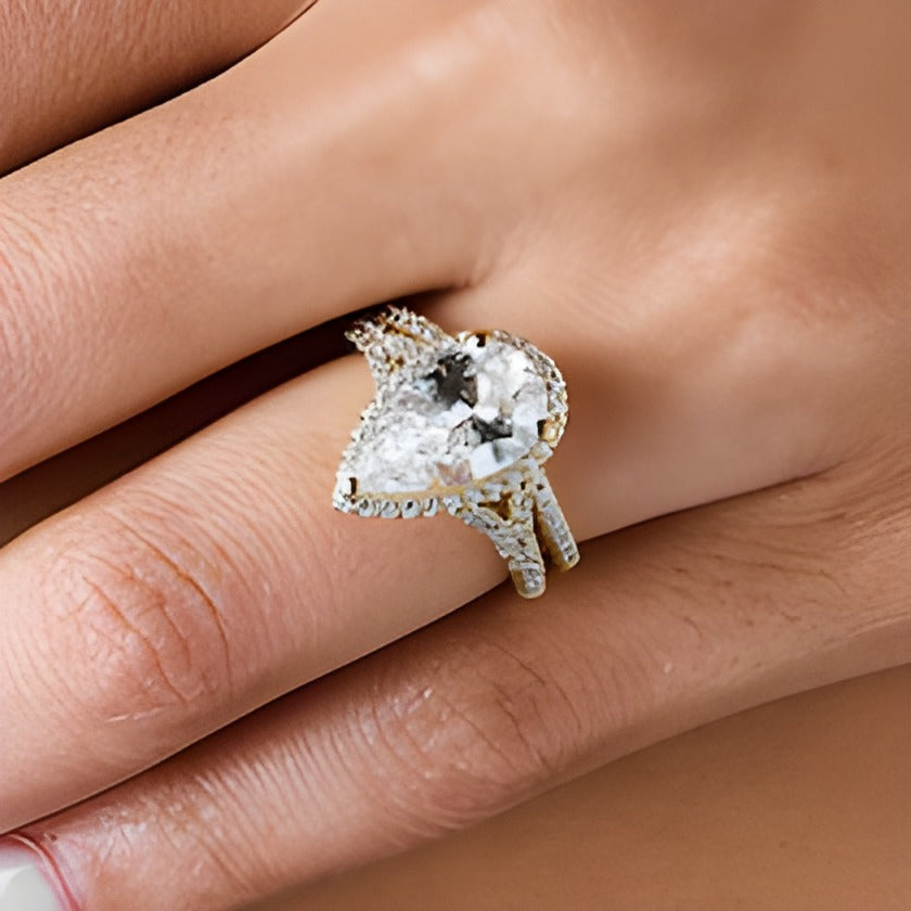 4.75 CT. TW Pear-Shaped Lab-Grown Diamond Frame Bridal Set in 14K Gold (F/VS2)