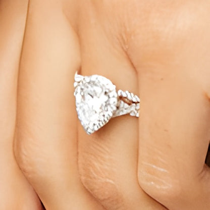 2.63 CT. TW Pear-Shaped Lab-Grown Diamond Frame Twist Shank Bridal Set in 14K White Gold (I/SI2)