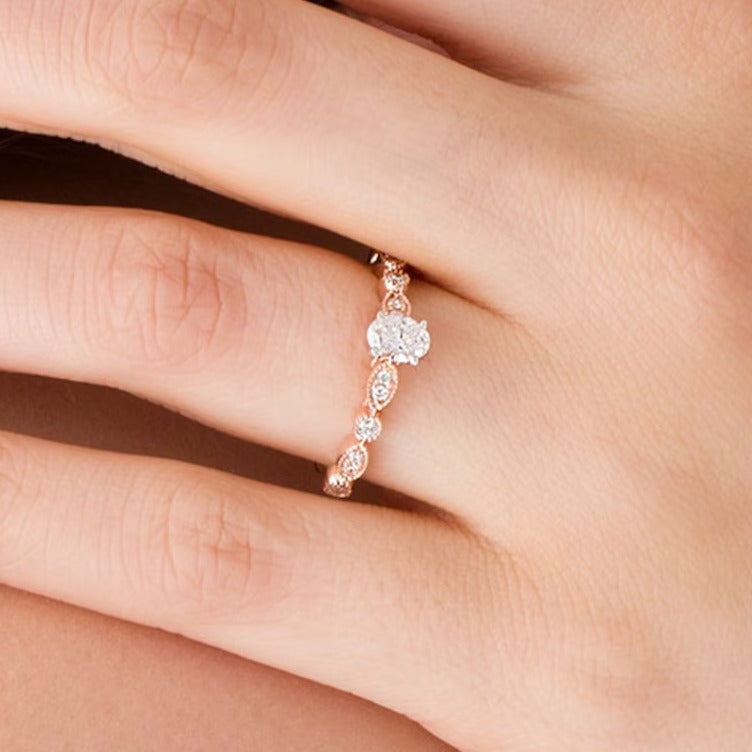 0.5 CT. TW Oval Diamond with Marquise Shapes Vintage-Style Engagement Ring in 10K Rose Gold