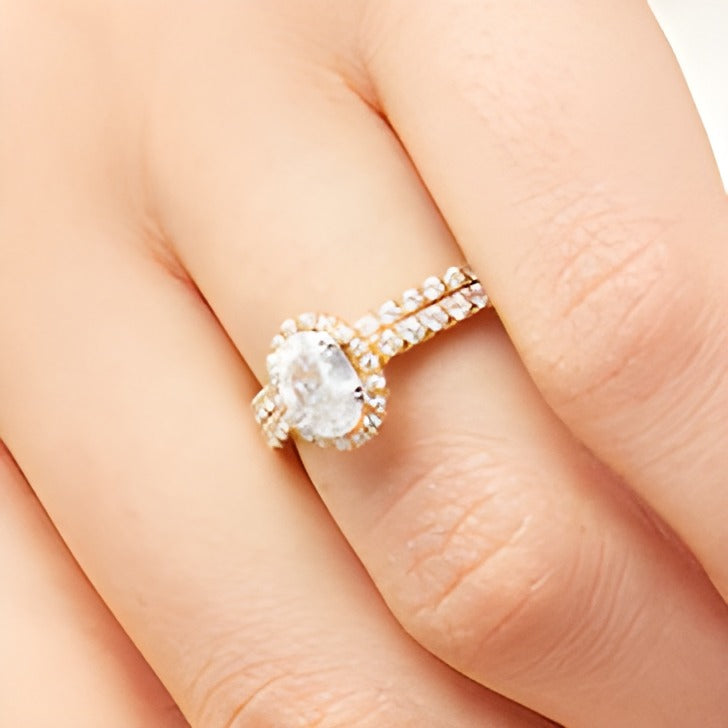 1.33 CT. TW Oval Lab-Grown Diamond Frame Bridal Set in 14K Gold (F/SI2)