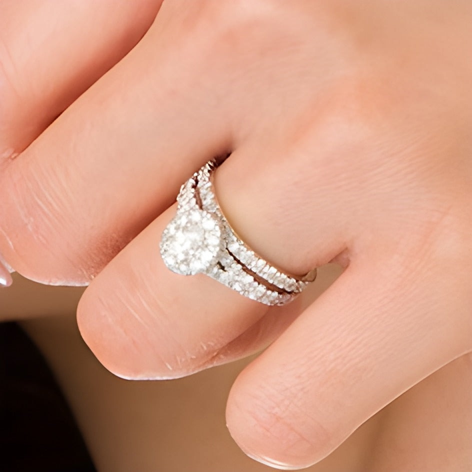 1.5 CT. TW Oval Diamond Frame Split Shank Bridal Set in 10K White Gold
