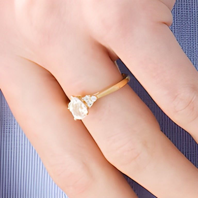 0.63 CT. TW Pear-Shaped Diamond Tri-Sides Engagement Ring in 14K Gold