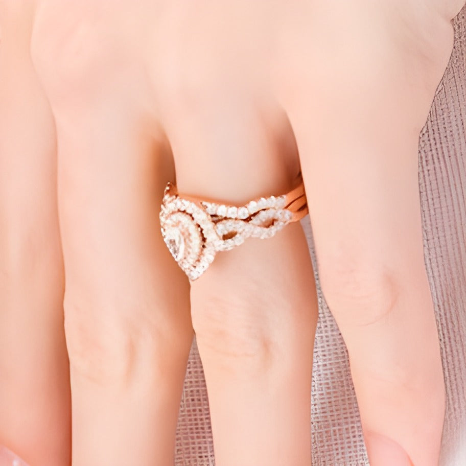 1.0 CT. TW Pear-Shaped Diamond Double Frame Twist Shank Bridal Set in 14K Rose Gold