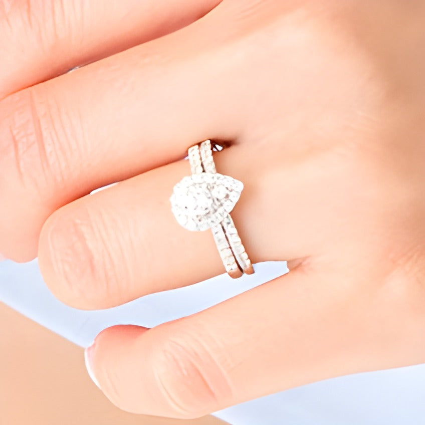 1.0 CT. TW Pear-Shaped Multi-Diamond Frame Bridal Set in 10K White Gold
