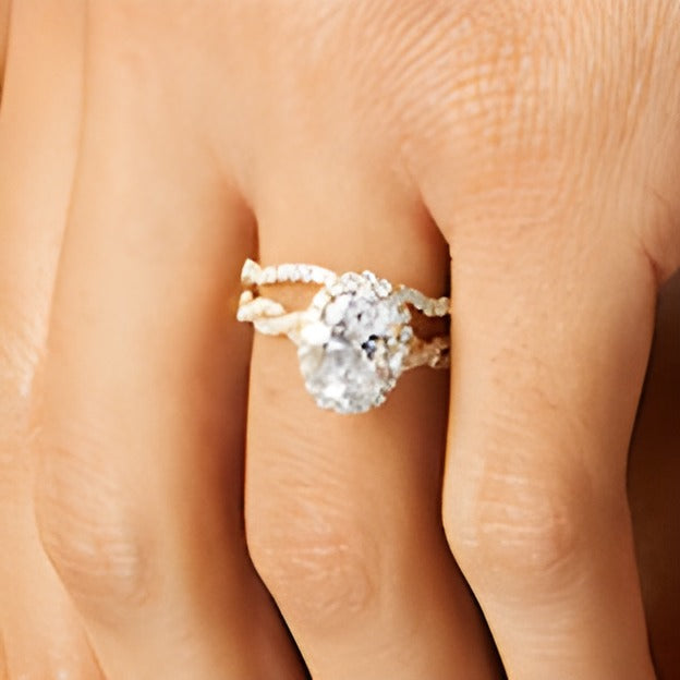 2.63 CT. TW Oval Lab-Grown Diamond Frame Twist Shank Bridal Set in 14K Gold (I/SI2)
