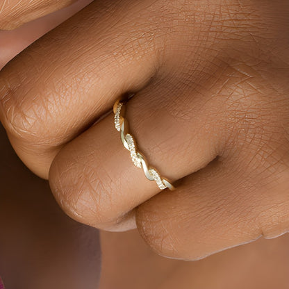 0.05 CT. TW Diamond Twist Wedding Band in 10K Gold