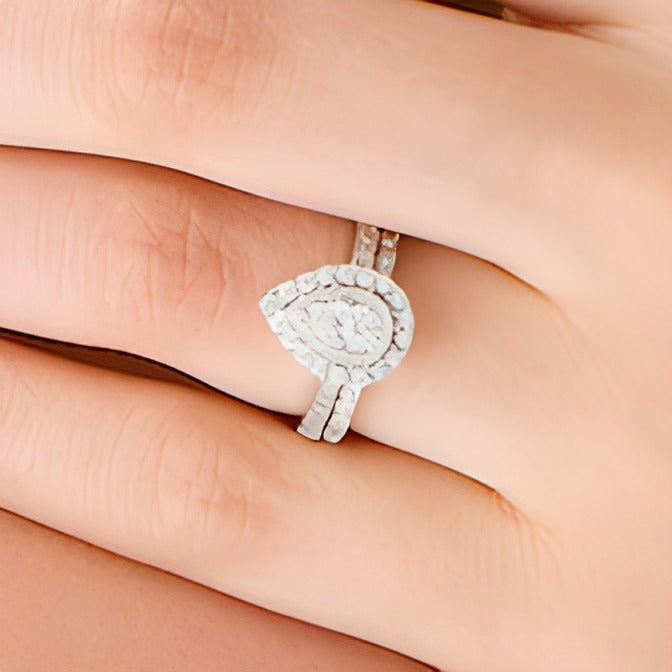 0.2 CT. TW Pear-Shaped Multi-Diamond Frame Vintage-Style Bridal Set in Sterling Silver