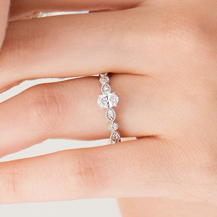 0.5 CT. TW Oval Diamond with Marquise Shapes Vintage-Style Engagement Ring in 10K White Gold