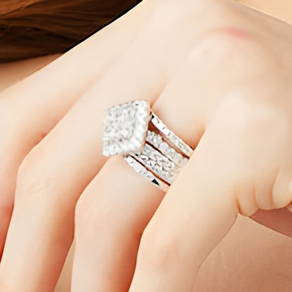 3.0 CT. TW Quad Princess-Cut Diamond Tilted Square Frame Three Piece Bridal Set in 14K White Gold