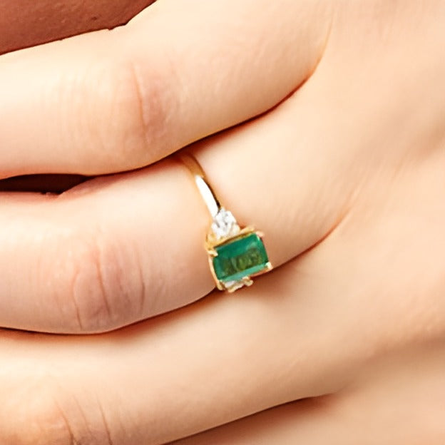 Emerald-Cut Emerald and 0.2 CT. TW Diamond Three Stone Ring in 14K Gold