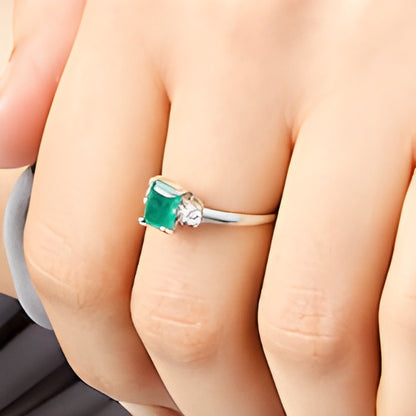Emerald-Cut Emerald and 0.2 CT. TW Diamond Three Stone Ring in 14K White Gold