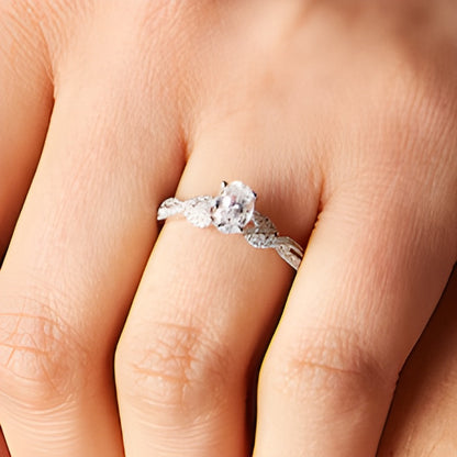 0.75 CT. TW Oval Diamond Twist Shank Engagement Ring in 14K White Gold