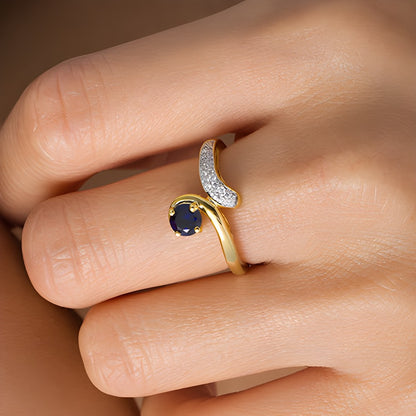 5.0mm Lab-Created Blue Sapphire and 0.1 CT. TW Diamond Bypass Ring in Sterling Silver with 14K Gold Plate
