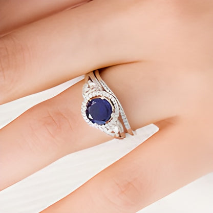 7.0mm Lab-Created Blue and White Sapphire and 0.25 CT. TW Diamond Frame Three Stone Bridal Set in Sterling Silver