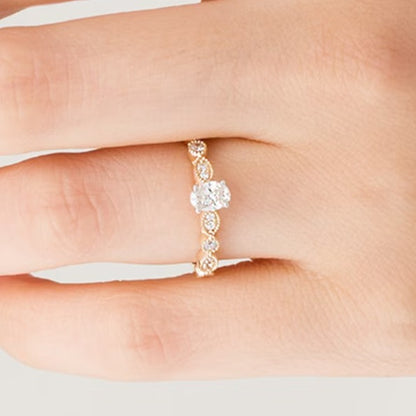 0.5 CT. TW Oval Diamond with Marquise Shapes Vintage-Style Engagement Ring in 10K Gold