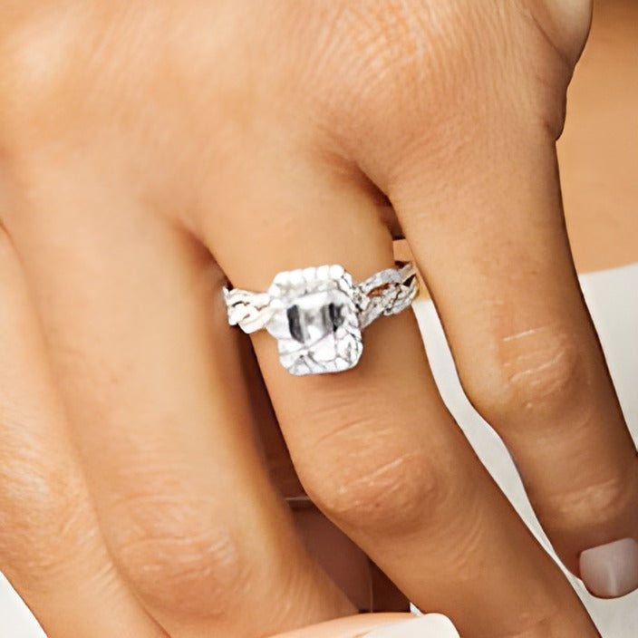 2.63 CT. TW Emerald-Cut Lab-Grown Diamond Frame Twist Shank Bridal Set in 14K White Gold (I/SI2)