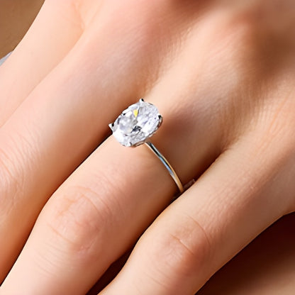 2.75 CT. TW Oval Lab-Grown Diamond Solitaire Hidden Halo Engagement Ring in 14K White Gold (F/VS2)