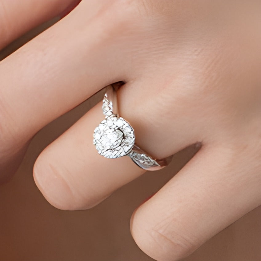 0.88 CT. TW Oval Diamond Frame Twist Shank Engagement Ring in 10K White Gold