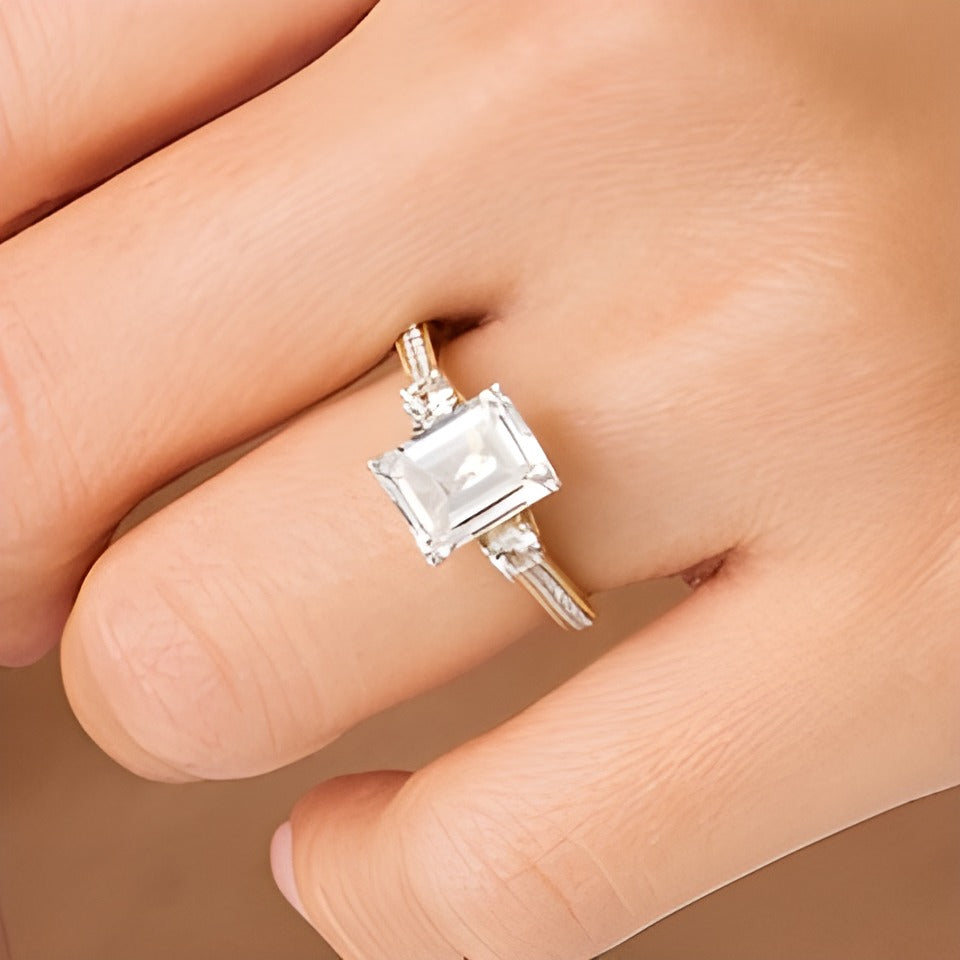 Emerald-Cut White Lab-Created Sapphire and 0.1 CT. TW Diamond Three Stone Engagement Ring in 14K Gold Over Silver