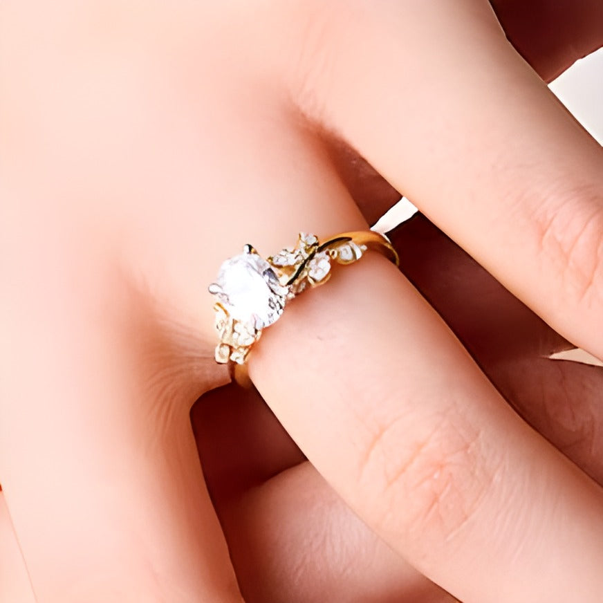 1.33 CT. TW Oval Lab-Grown Diamond Leaf Shank Engagement Ring in 14K Gold (F/VS2)