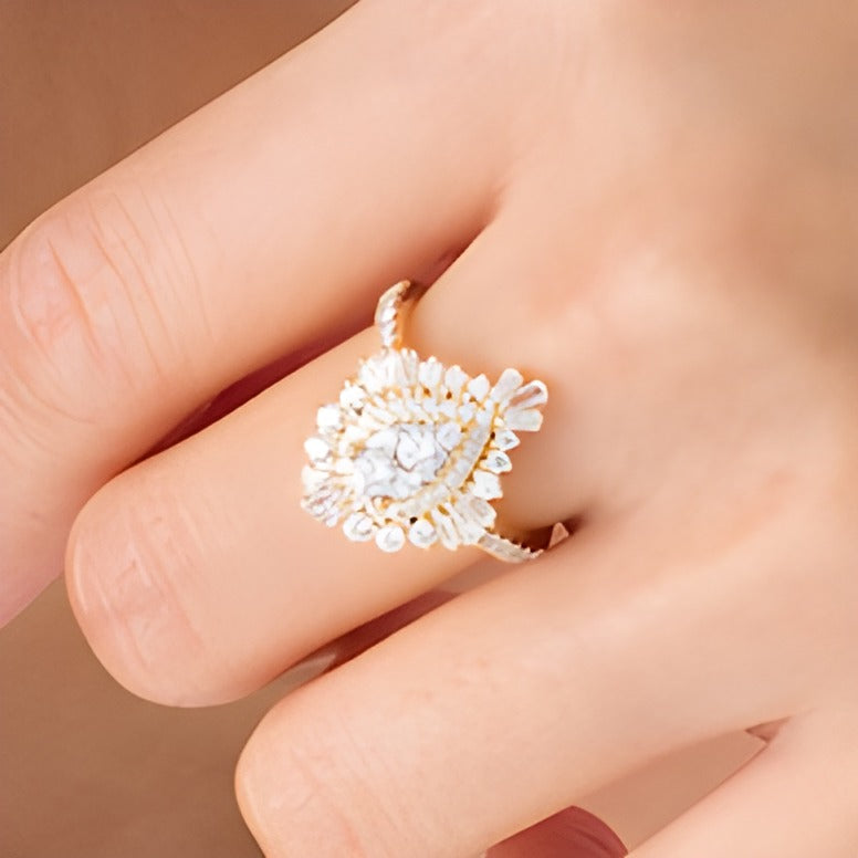 1.5 CT. TW Composite Diamond Teardrop Starburst Frame Ring in 14K Gold