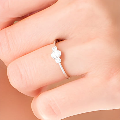 0.5 CT. TW Oval and Round Diamond Three Stone Engagement Ring in 14K White Gold