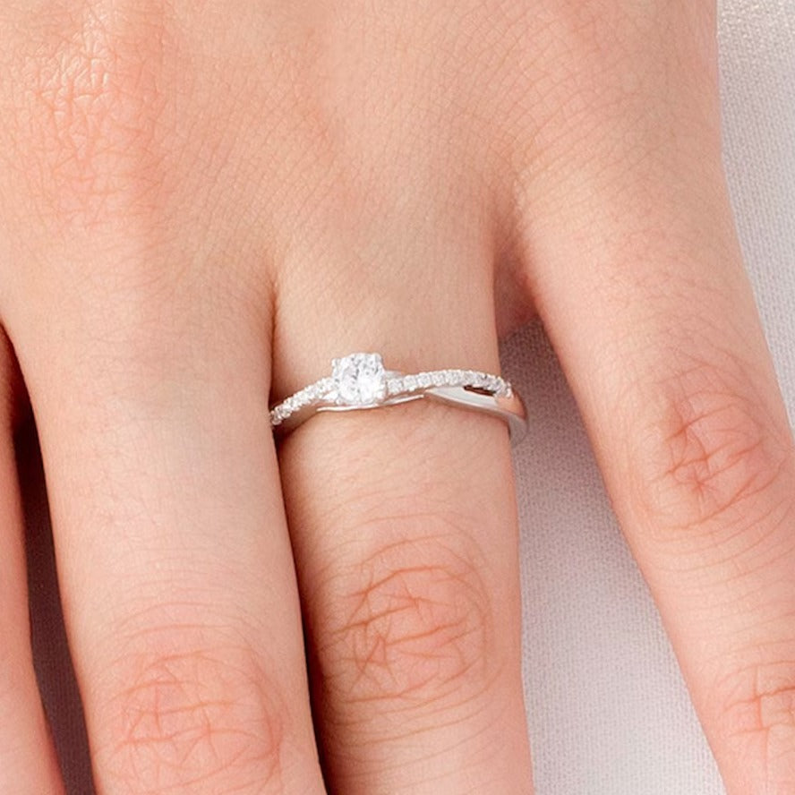 0.33 CT. TW Diamond Twist Engagement Ring in 10K White Gold