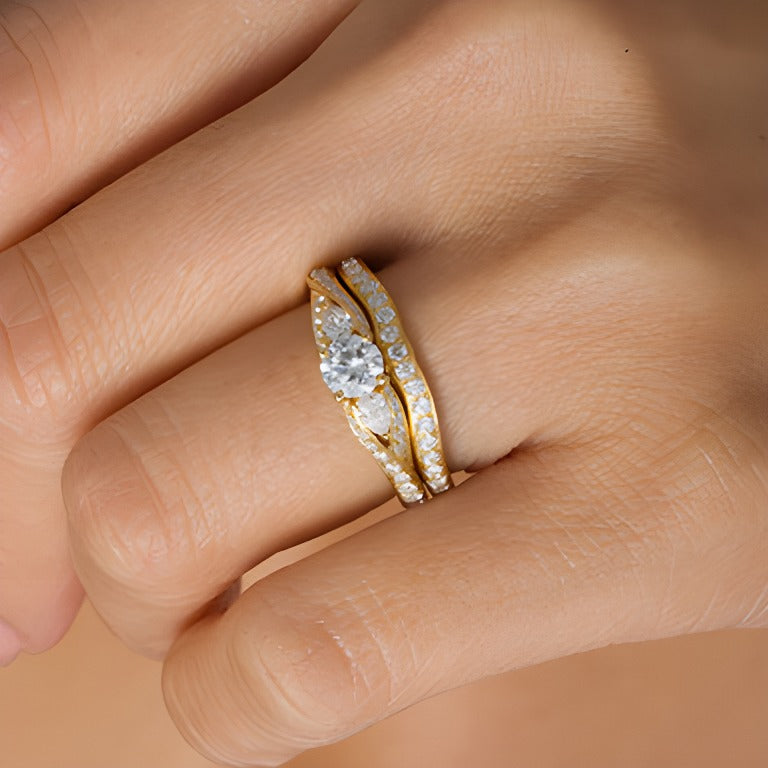 1.38 CT. TW Diamond Bypass Ribbon Three Stone Bridal Set in 14K Gold