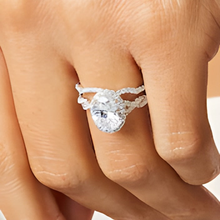 2.63 CT. TW Oval Lab-Grown Diamond Frame Twist Shank Bridal Set in 14K White Gold (I/SI2)
