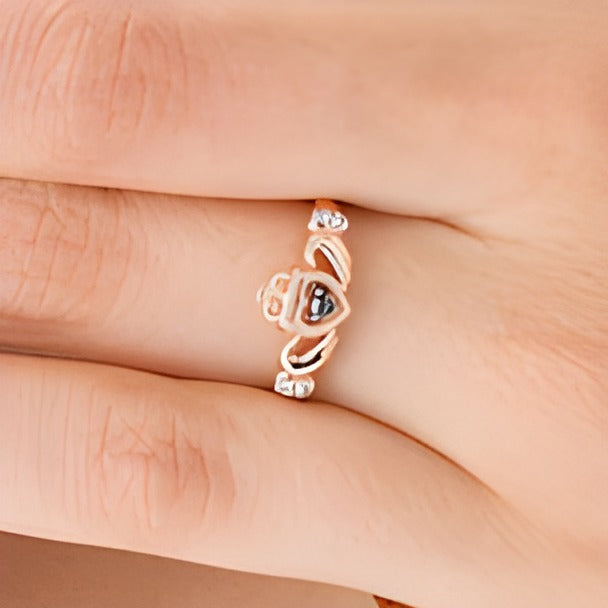0.05 CT. TW Enhanced Black and White Diamond Claddagh Ring in 10K Rose Gold