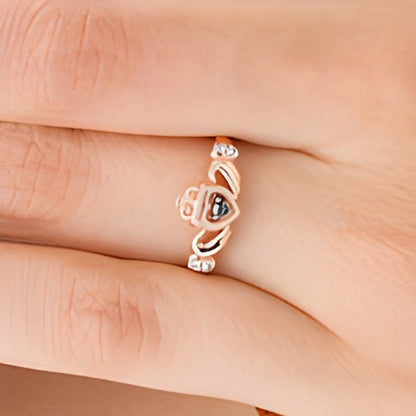0.05 CT. TW Enhanced Black and White Diamond Claddagh Ring in 10K Rose Gold