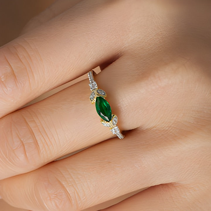 Sideways Marquise Lab-Created Emerald and 0.1 CT. TW Diamond Petals Ring in 10K Gold