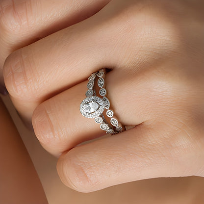 0.5 CT. TW Oval Diamond Frame Bridal Set in 14K Gold