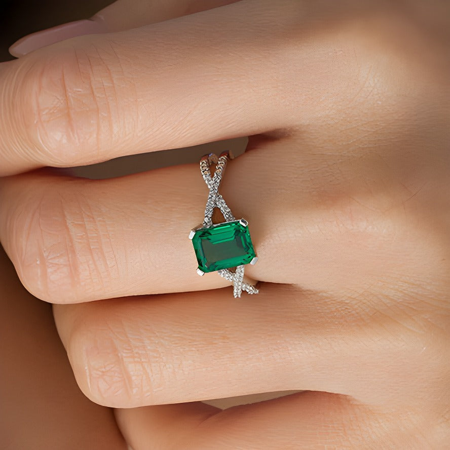 Emerald-Cut Lab-Created Emerald and 0.1 CT. TW Diamond Criss-Cross Split Shank Ring in 10K White Gold