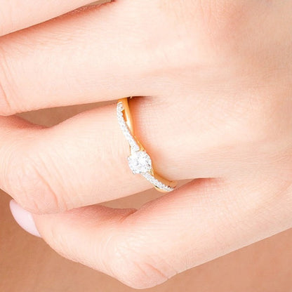 0.33 CT. TW Diamond Twist Shank Engagement Ring in 10K Gold