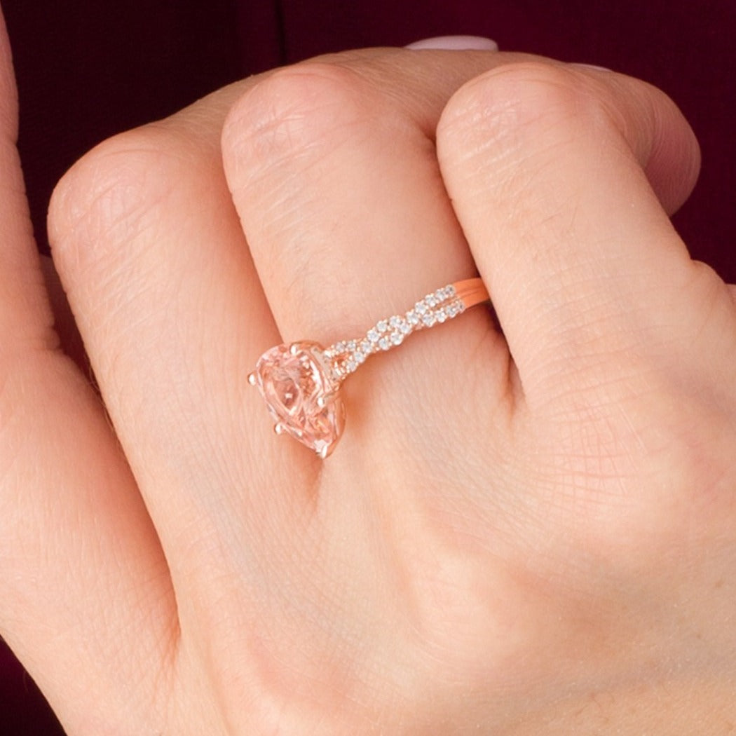 Pear-Shaped Morganite and 0.2 CT. TW Diamond Twist Shank Engagement Ring in 10K Rose Gold