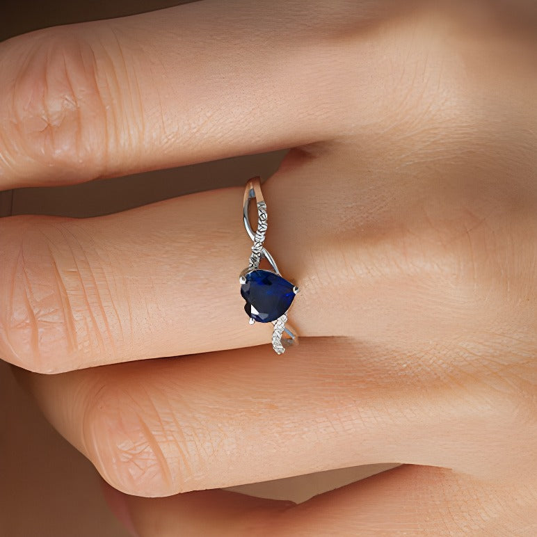 6.0mm Heart-Shaped Lab-Created Blue Sapphire and 0.05 CT. TW Diamond Twist Shank Ring in 10K White Gold