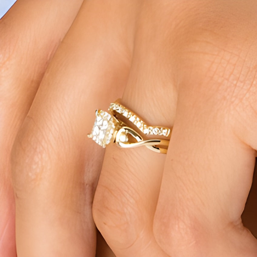 0.33 CT. TW Quad Diamond Cushion-Shaped Frame Twist Shank Bridal Set in 10K Gold