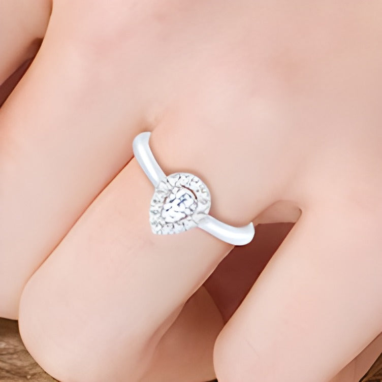 0.25 CT. TW Pear-Shaped Diamond Frame Promise Ring in 10K White Gold