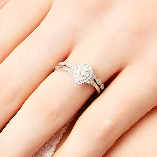 0.25 CT. TW Pear-Shaped Multi-Diamond Vintage Style Bridal Set in 10K White Gold