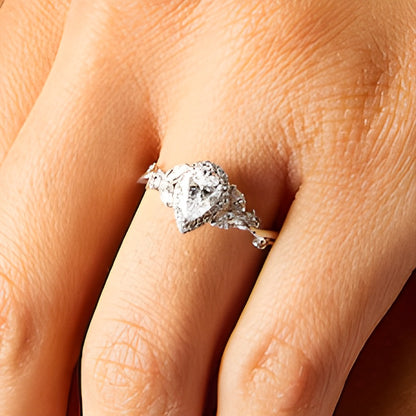 1.0 CT. TW Pear-Shaped Diamond Frame Leaf-Sides Engagement Ring in 14K White Gold