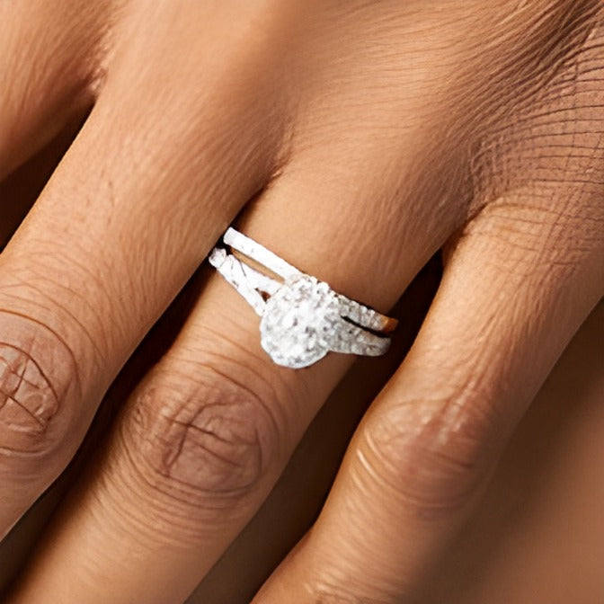 1.25 CT. TW Oval Diamond Frame Split Shank Bridal Set in 14K Gold