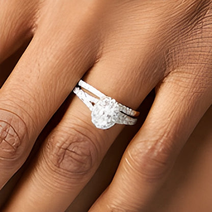 1.25 CT. TW Oval Diamond Frame Split Shank Bridal Set in 14K Gold